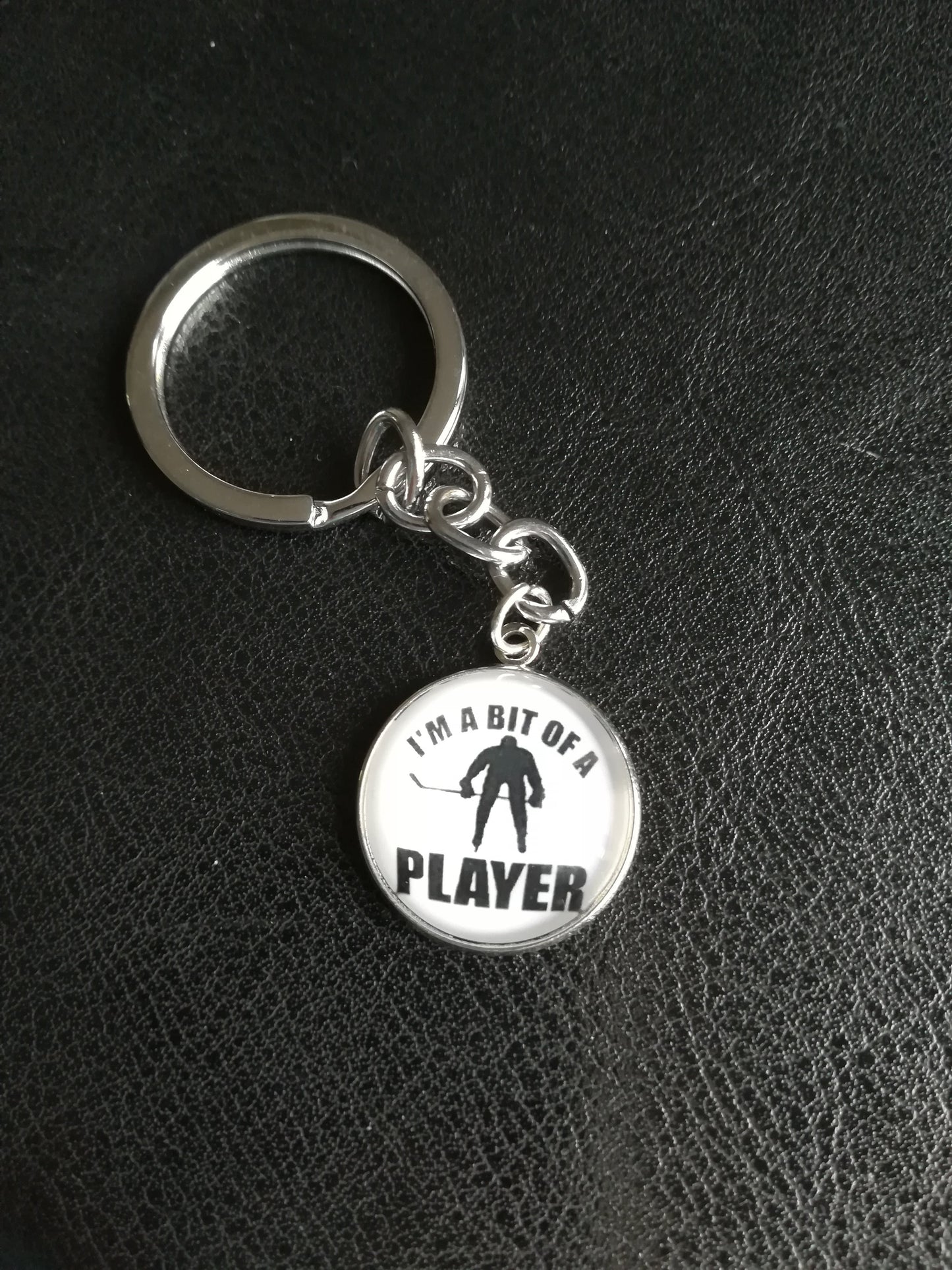 Jääkiekko avaimenperä "I'm a bit of a player" - FourFan